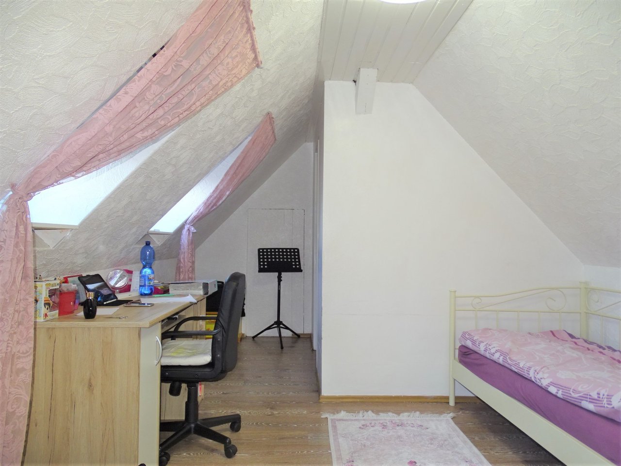 Mehrfamilienhaus mit lukrativer Gewerbefläche und viel Potenzial!