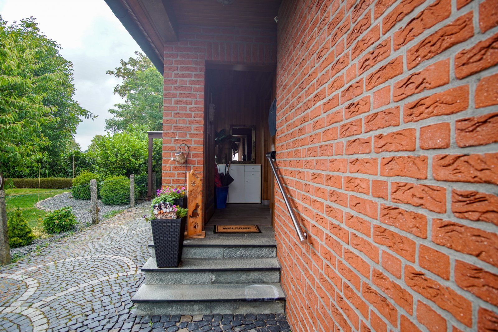 Wohngenuss mit Charme - gepflegtes Ein- bis Zweifamilienhaus mit Wintergarten