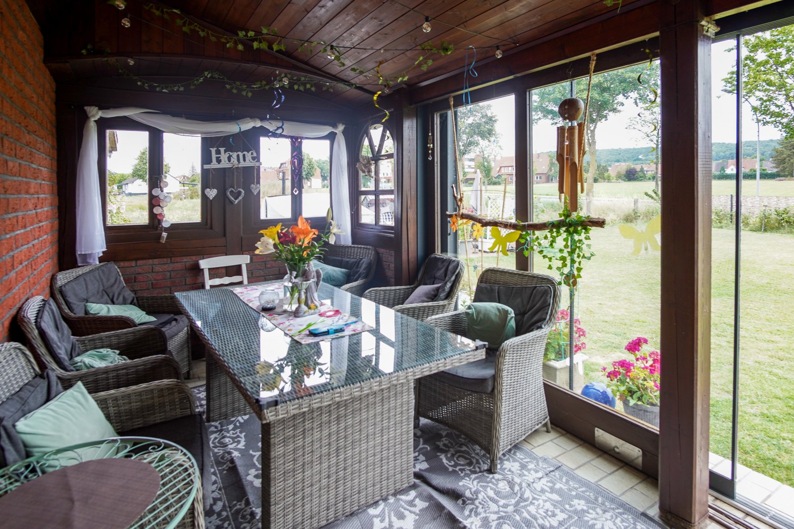 Wohngenuss mit Charme - gepflegtes Ein- bis Zweifamilienhaus mit Wintergarten