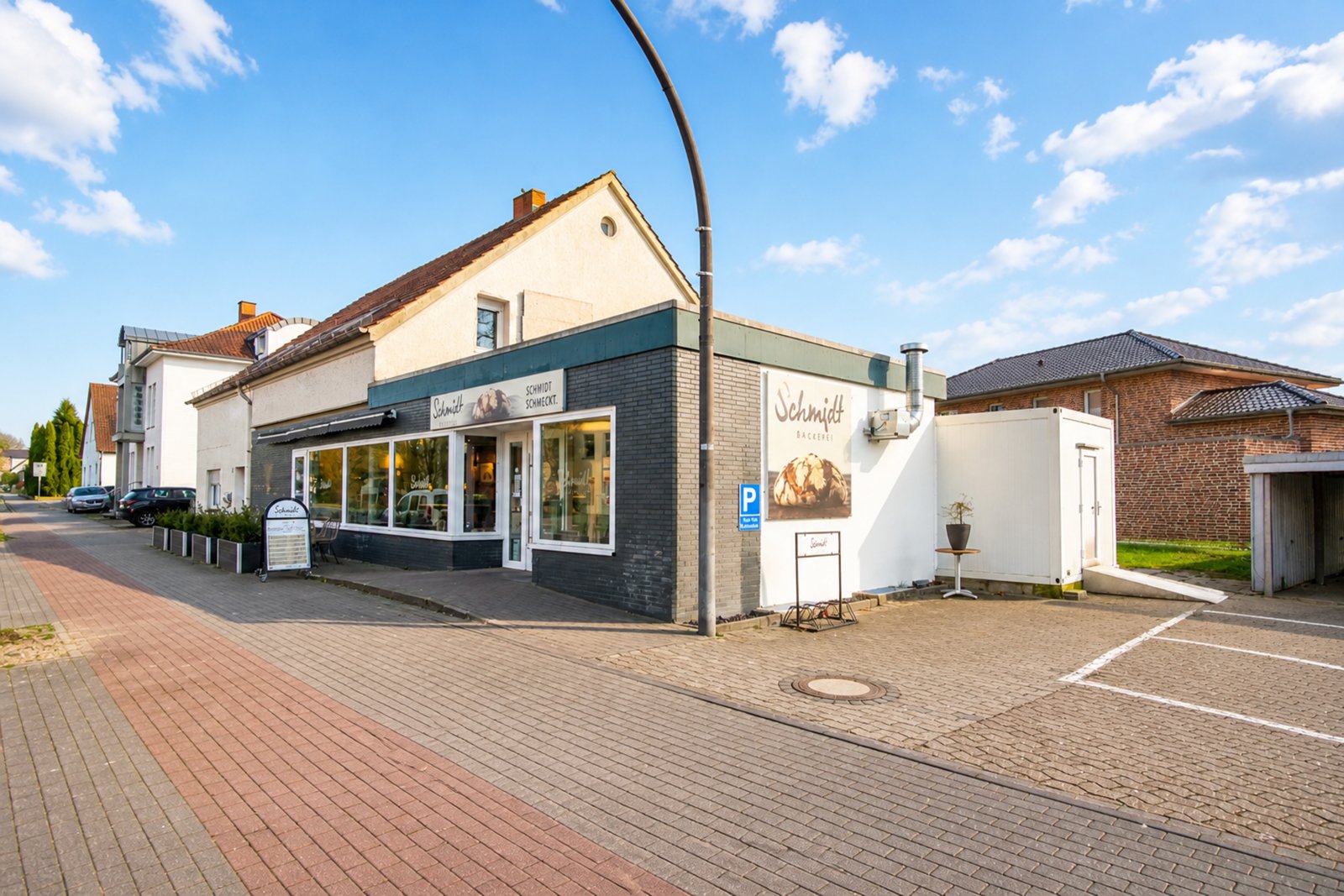 Zweifamilienhaus mit vermietetem Ladenlokal auf ca. 430 m² Gesamtfläche in zentraler Lage