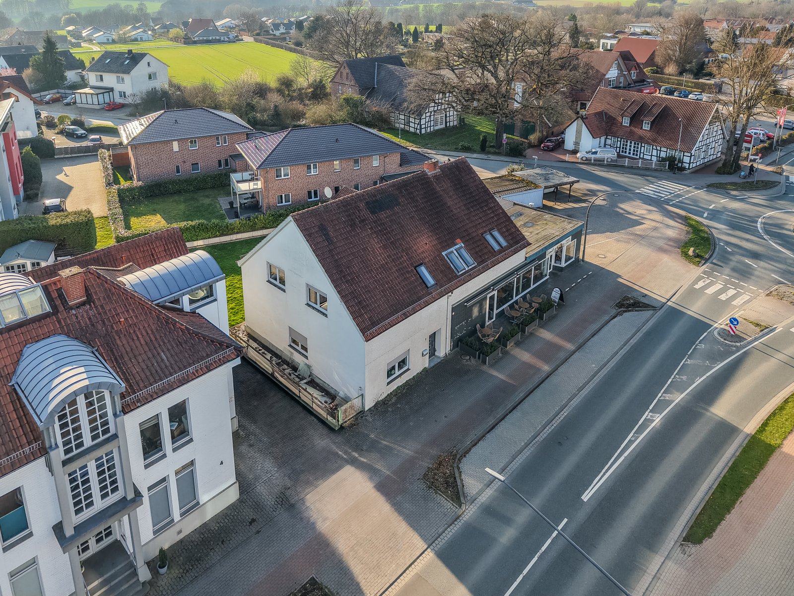 Zweifamilienhaus mit vermietetem Ladenlokal auf ca. 430 m² Gesamtfläche in zentraler Lage